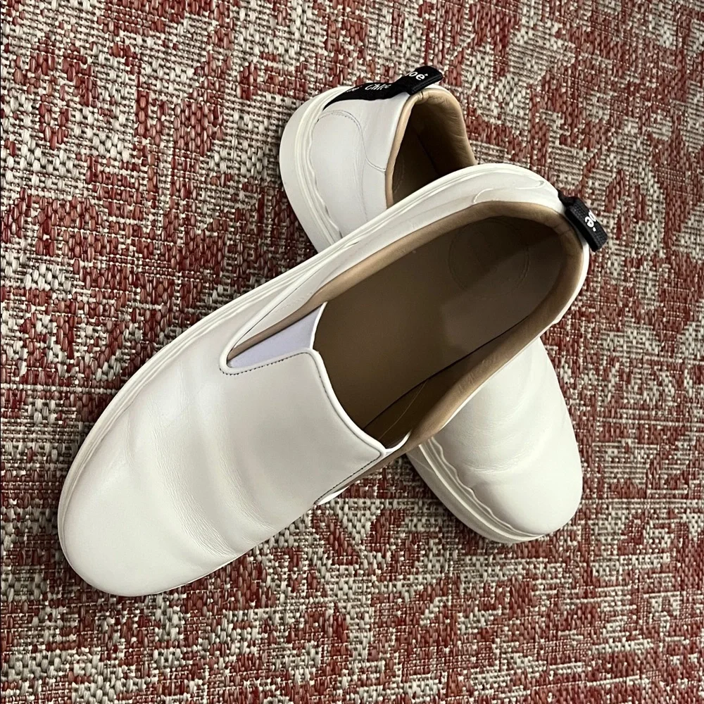 Chloe White Slip-On Sneakers - Picture 1 of 9